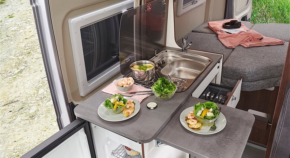Kitchenette with compressor fridge | Double-hinged to enable easy access from inside and outside the vehicle